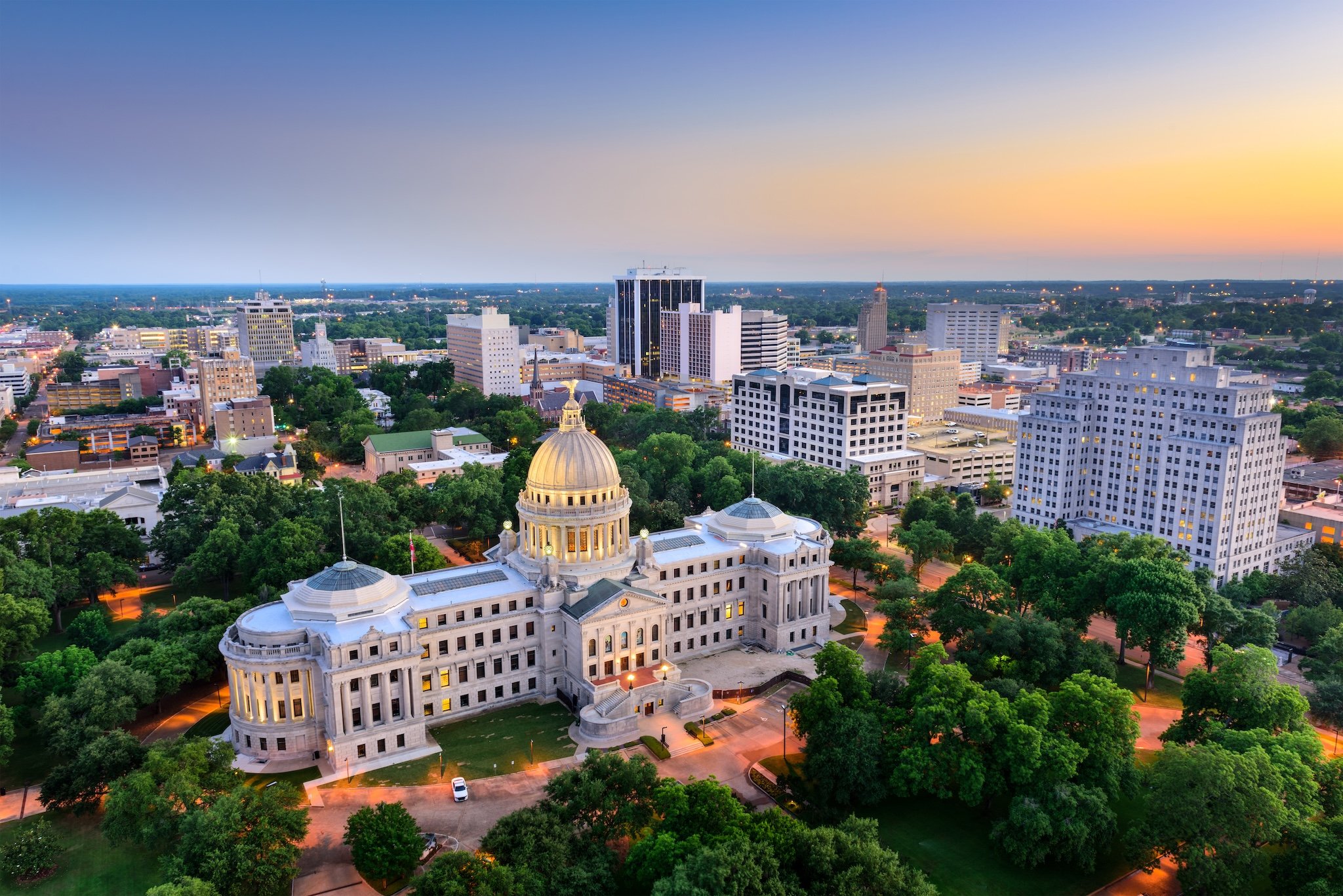Aerial view of the Mississippi State Capitol building with cityscape.